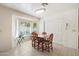 Cozy dining area with a bay window and tile flooring at 63 W Los Arboles Dr, Tempe, AZ 85284