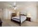 Spacious main bedroom boasts a large window and comfortable furnishings at 63 W Los Arboles Dr, Tempe, AZ 85284