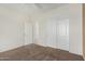 Bright bedroom with carpet floors, ceiling fan, and closet with sliding doors at 6372 S Callaway Dr, Chandler, AZ 85249