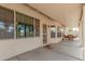 Large, covered patio perfect for entertaining, with exterior door and ample seating area at 6372 S Callaway Dr, Chandler, AZ 85249