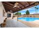 Spacious covered patio area with views of the pool at 742 E Garnet Ave, Mesa, AZ 85204