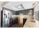 Kitchen with stainless steel appliances and granite countertops at 742 E Garnet Ave, Mesa, AZ 85204
