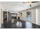 Open-concept living area with the kitchen and dining featuring a view of the beautiful pool at 742 E Garnet Ave, Mesa, AZ 85204