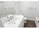Bathroom with a single sink, white countertops, framed mirror and shower at 7531 E Billings St # 123, Mesa, AZ 85207
