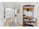 Bright home entryway with tile flooring and a storage shelf for shoes and accessories at 763 E Park Ave, Chandler, AZ 85225