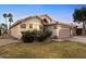 Charming single-story home with a well-maintained lawn, desert landscaping and a two-car garage at 763 E Park Ave, Chandler, AZ 85225