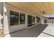 Covered patio featuring wood plank ceiling and large windows overlooking backyard at 7869 W Market St, Glendale, AZ 85303
