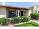 Inviting front porch featuring stylish seating and well-maintained landscaping at 8140 N 107Th Ave # 142, Peoria, AZ 85345
