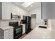 Modern kitchen with stainless steel appliances and quartz countertops at 8140 N 107Th Ave # 142, Peoria, AZ 85345