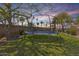 Large backyard featuring a trampoline, providing a fun and active outdoor space at 890 W Zion Pl, Chandler, AZ 85248
