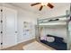 A bedroom with a unique loft bed, reading nook, and playful decor at 890 W Zion Pl, Chandler, AZ 85248