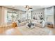 Cozy living room with a large sectional sofa, neutral tones, natural light, and modern decor at 890 W Zion Pl, Chandler, AZ 85248