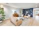 Stylish living room with a piano, modern furnishings, and an open concept design at 890 W Zion Pl, Chandler, AZ 85248