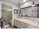 Elegant bathroom boasting double sinks, stylish fixtures, and a glass-enclosed shower at 945 N Pasadena -- # 35, Mesa, AZ 85201