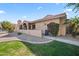 A single-story home featuring desert landscaping and a private walled patio at 945 N Pasadena -- # 35, Mesa, AZ 85201