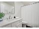 Bright bathroom featuring a modern vanity, mirror, and shower with neutral walls at 10351 E Morning Star Dr, Scottsdale, AZ 85255