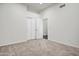 Spacious, carpeted bedroom with ample closet space and natural light at 10351 E Morning Star Dr, Scottsdale, AZ 85255