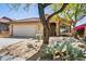Single-Gathering home showing a desert landscape and an attached two-car garage at 10351 E Morning Star Dr, Scottsdale, AZ 85255
