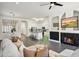 Inviting living room with a fireplace and open access to the kitchen and dining area at 10351 E Morning Star Dr, Scottsdale, AZ 85255