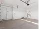 Garage featuring lots of space, and interior access, providing convenience and security at 11660 W Luxton Ln, Avondale, AZ 85323