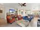 Inviting living room with tile floors, neutral walls, and modern decor at 12425 W Jefferson St, Avondale, AZ 85323