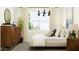 Serene bedroom with large window, light drapes, and wooden dresser at 17551 W Victory St, Goodyear, AZ 85338