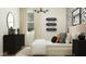 Chic bedroom featuring modern decor, statement wallpaper, and a comfortable bed at 17551 W Victory St, Goodyear, AZ 85338