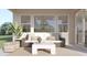 Relaxing covered patio with comfortable seating and stylish decor elements at 17563 W Victory St, Goodyear, AZ 85338