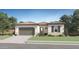 Charming single-story home with a tile roof and well-maintained landscaping at 17563 W Victory St, Goodyear, AZ 85338