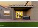 The backyard has a jacuzzi, brick patio, and artificial turf at 17813 W Pinnacle Vista Dr, Surprise, AZ 85387