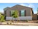 Charming single-story house featuring drought-resistant landscaping and a well-kept appearance at 17813 W Pinnacle Vista Dr, Surprise, AZ 85387