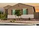 Beautiful single-story home with desert landscaping, accentuating its curb appeal at 17813 W Pinnacle Vista Dr, Surprise, AZ 85387