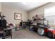 Functional office space with ample shelving, work area, and neutral color palette at 19887 N Herbert Ave, Maricopa, AZ 85138
