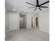 Spacious bonus room featuring neutral walls, carpet, and access to other rooms and closets at 20733 W Alsap Rd, Buckeye, AZ 85396
