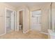 Hallway leading into the main bedroom, contains the entrance to a powder room at 20733 W Alsap Rd, Buckeye, AZ 85396