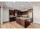 Spacious kitchen with a center island, stainless steel appliances, and ample counter space for cooking at 20733 W Alsap Rd, Buckeye, AZ 85396