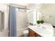 Cozy bathroom featuring a vanity, toilet, and shower with curtain at 21840 N 41St St, Phoenix, AZ 85050