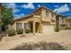 Two story home featuring neutral paint, an attached two car garage, and well maintained landscaping at 21840 N 41St St, Phoenix, AZ 85050