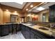 A bathroom with granite counters, and sinks and plenty of storage at 25639 S Beech Creek Dr, Sun Lakes, AZ 85248