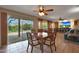 Cozy dining area offers a view to the backyard and access to the backyard patio at 25639 S Beech Creek Dr, Sun Lakes, AZ 85248