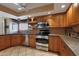 A kitchen featuring stainless appliances and ample counter space at 25639 S Beech Creek Dr, Sun Lakes, AZ 85248