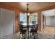 Eat-in kitchen nook with large windows, tile floors and view of the backyard at 25639 S Beech Creek Dr, Sun Lakes, AZ 85248