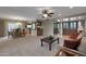 Open-concept living space with dining area, and views to front entry at 25639 S Beech Creek Dr, Sun Lakes, AZ 85248