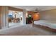 Comfortable main bedroom, dresser, and mirrored cabinet leading to other living spaces at 25639 S Beech Creek Dr, Sun Lakes, AZ 85248