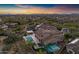 Aerial view of estate featuring a pool, spa, outdoor kitchen, basketball court and fire pit at 30129 N 52Nd Pl, Cave Creek, AZ 85331