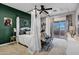 Elegant bedroom with a canopy bed, soft textures, and a private balcony at 30129 N 52Nd Pl, Cave Creek, AZ 85331