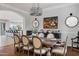 Elegant dining room featuring a large table with seating and a decorative chandelier, great for entertaining at 30129 N 52Nd Pl, Cave Creek, AZ 85331