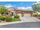 Charming two-story home featuring a three-car garage and a beautifully landscaped front yard at 30129 N 52Nd Pl, Cave Creek, AZ 85331