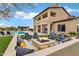 Inviting backyard firepit area with comfortable seating, ideal for cozy evenings and entertaining guests at 30129 N 52Nd Pl, Cave Creek, AZ 85331
