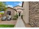 Attractive front entrance with stone accents, desert landscaping and an inviting walkway at 30129 N 52Nd Pl, Cave Creek, AZ 85331